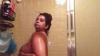 Taking a shower playing w/my titties