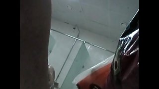 Hidden shower cam man shoots slim doll in distance