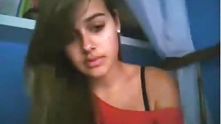 girl flashes her small tits and rubs her shaved pussy standup